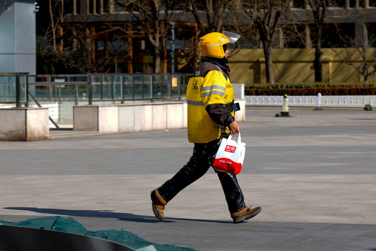 China calls on delivery, ride-hailing firms to respect gig-worker rights ahead of holiday