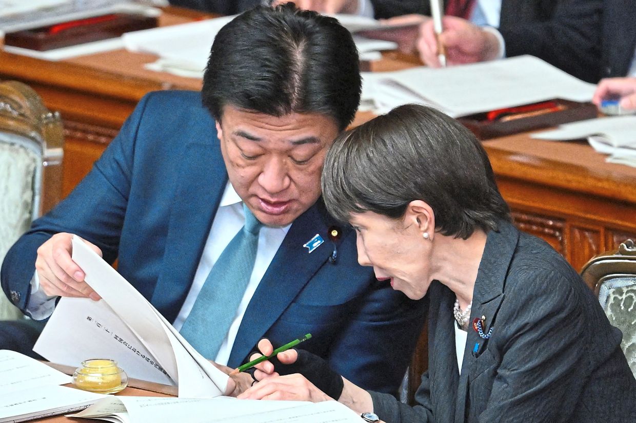 ومن المرجح أن يقوم بنك اليابان برفع أسعار الفائدة في مارس إذا ضعف الين