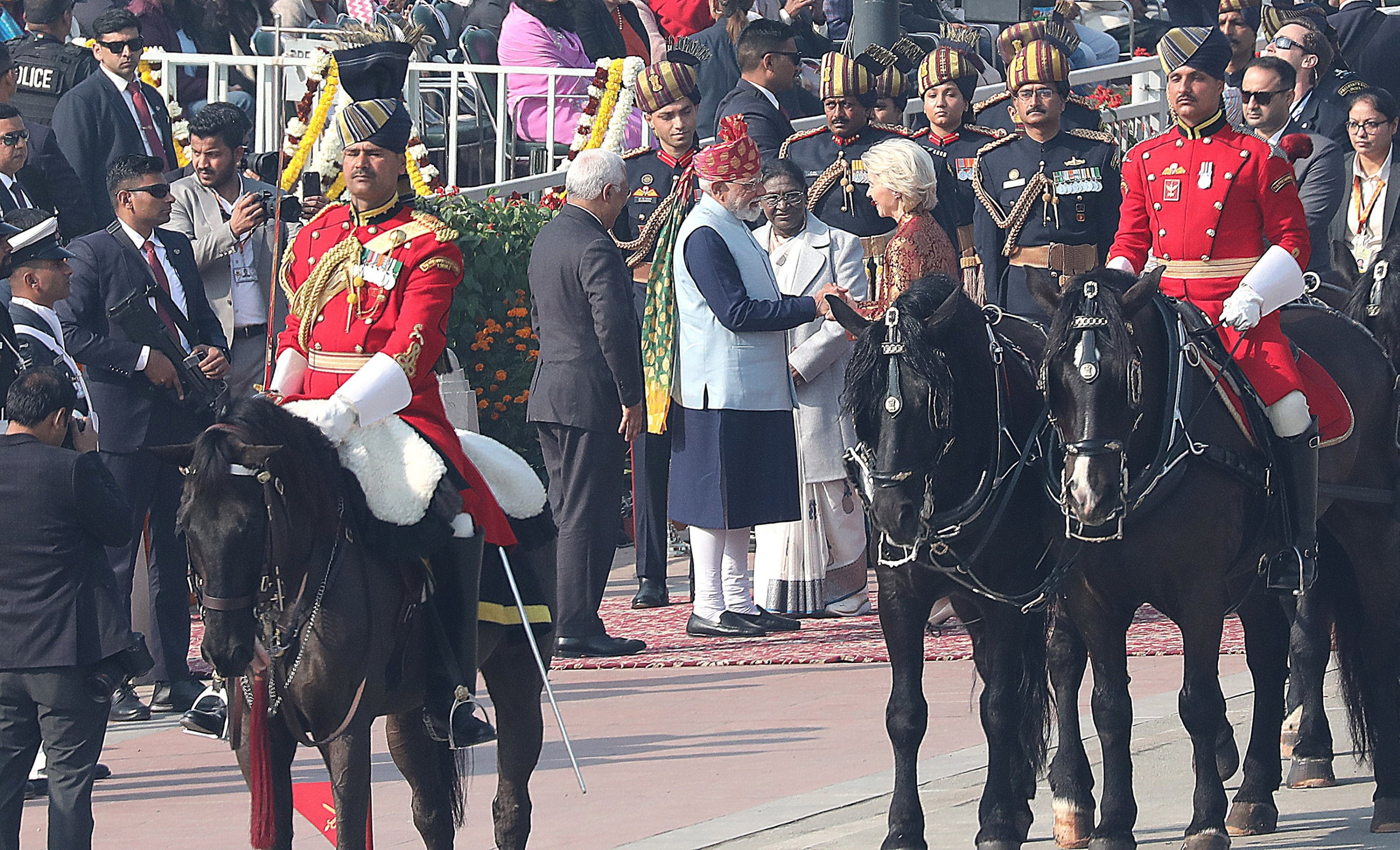 EU officials join India's pomp parade ahead of major trade deal