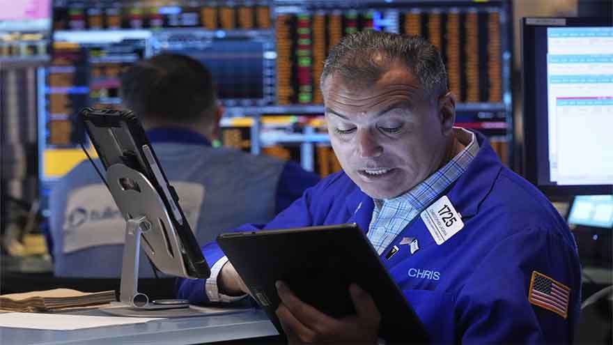 Brent crude briefly tops $119 per barrel before pulling back, and stocks sink worldwide