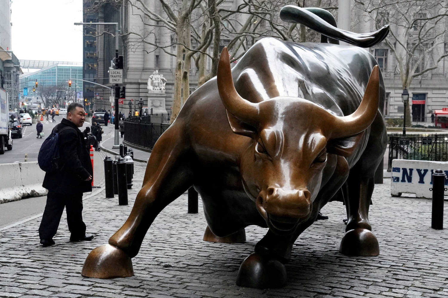 Dollar holds gains on economic data, Fed bets; Aussie jumps on RBA hike