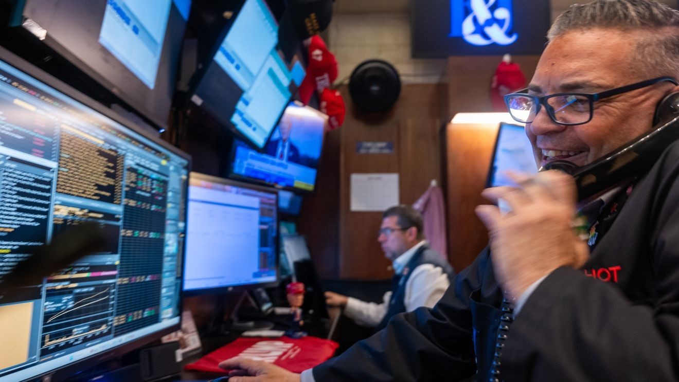 Dow surges 1,102 points, briefly tops 50,000 as S&P 500 logs best day since May