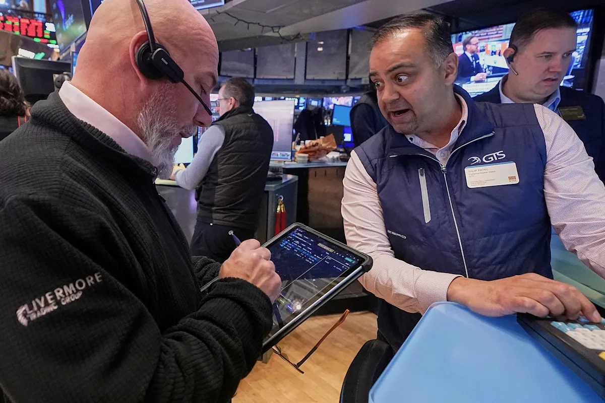 Dow crosses 50,000 mark, leading S&P 500, Nasdaq higher as Wall Street rebounds from rout