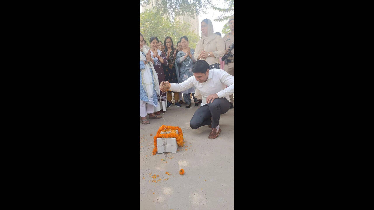 Work starts to lay block tiles on unpaved road in Sector 84