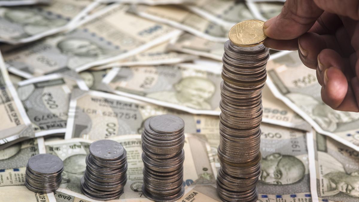 Rupee falls 11 paise to close at 90.43 against U.S. dollar