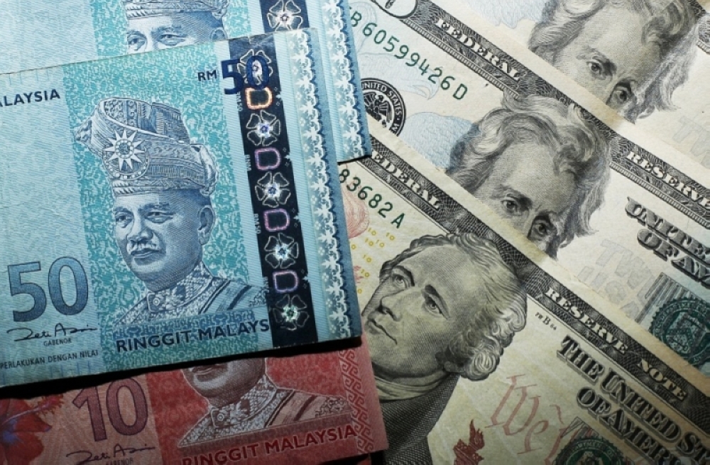 Ringgit nears seven-year high against US dollar as BNM holds rates, risk appetite rises